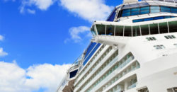 Side view of cruise ship on the blue sky background